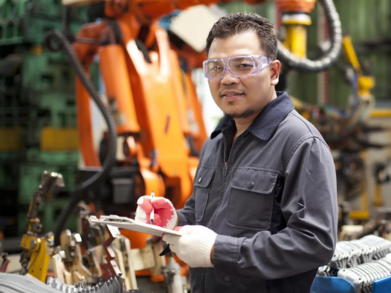 Worker in manufacturing plant